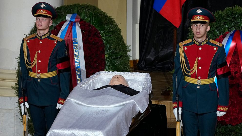 Honour guards stand by the coffin of former Soviet President Mikhail Gorbachev inside the Pillar Hall of the House of the Unions during a farewell ceremony in Moscow, Russia, Saturday, Sept. 3, 2022. Gorbachev, who died Tuesday at the age of 91, will