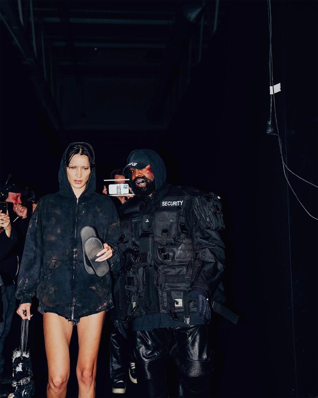 Kanye West tampil di atas catwalk selama Balenciaga Fashion Week yang berlumpur di Paris