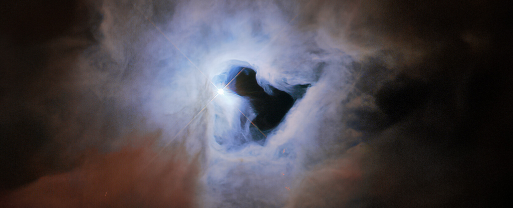 Teleskop Hubble telah menemukan 'lubang kunci kosmik' jauh di luar angkasa dan kami kagum: ScienceAlert