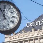 Credit Suisse membayar utang untuk menenangkan investor