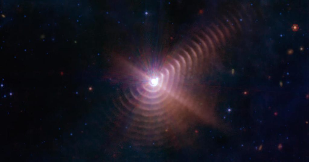 Sepasang bintang membuat 'sidik jari' pada gambar yang diambil oleh Teleskop Luar Angkasa James Webb