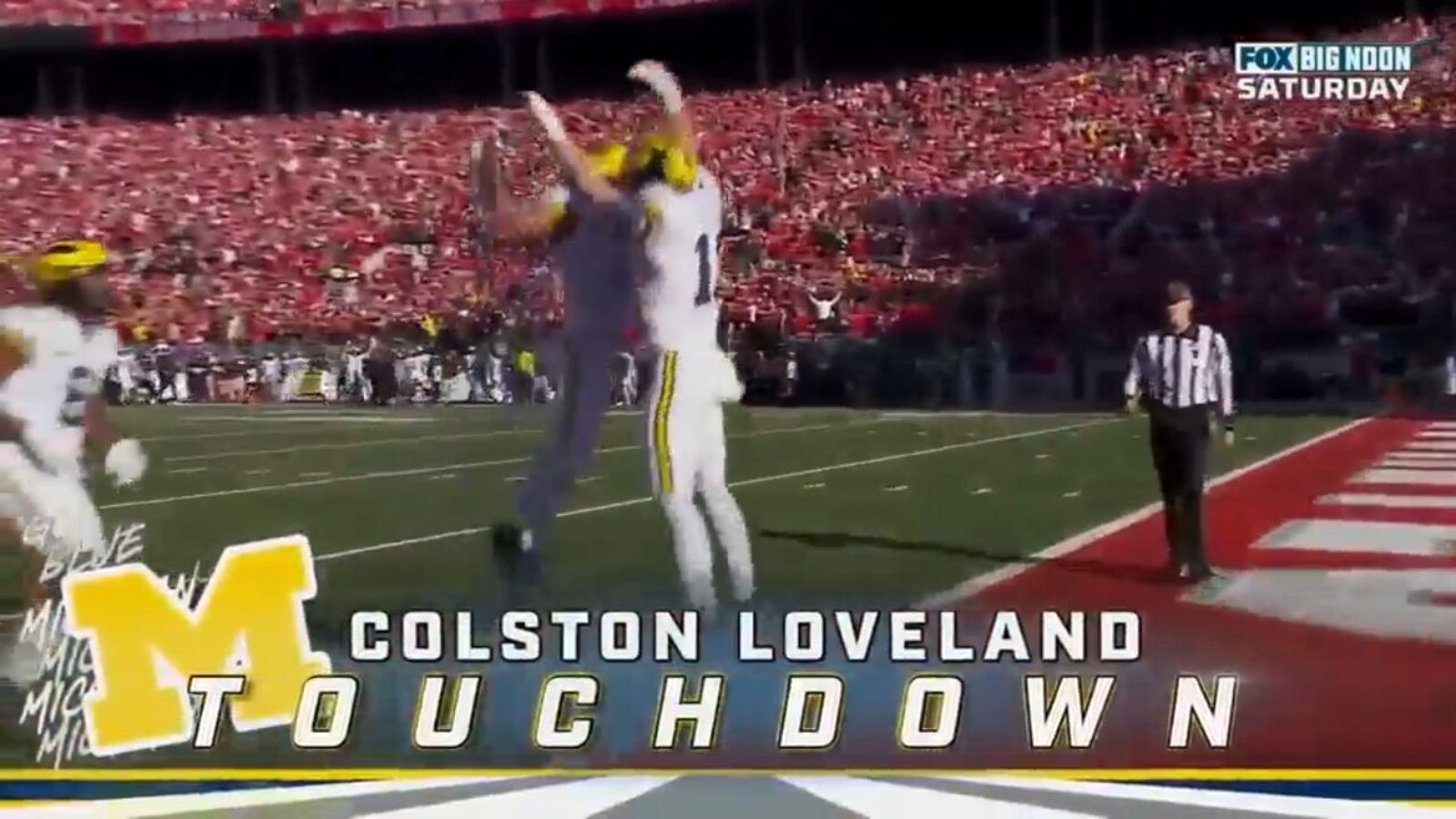 Michigan JJ McCarthy memukul Colston Loveland untuk touchdown 45 yard